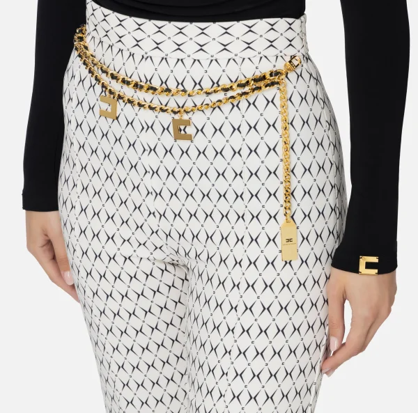 Elisabetta Franchi Tailleur | Pantaloni E Shorts^Pantalone a palazzo in crêpe stampa rombo con catena Burro/Nero